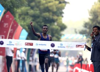 Ethiopia’s Chala Regasa and Kenya’s Irine Cheptai win in the