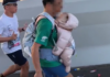 Man runs marathon with newborn is disqualified at the 15km mark