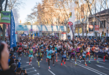 Ethiopian Hagos Gebrhiwet and Kenyan Loice Chemnung win the Mitja Marató de Barcelona half marathon